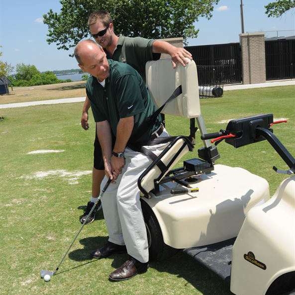 man plays golf with use of adaptive golf cart