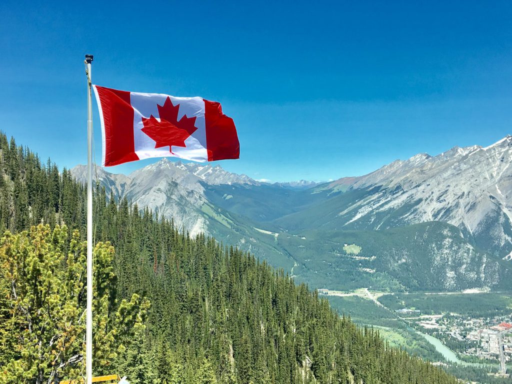 Canadian flag on mountain 