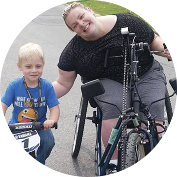 Megan and her son riding their cycles