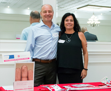 Representatives from a sponsor for SCIO at an event