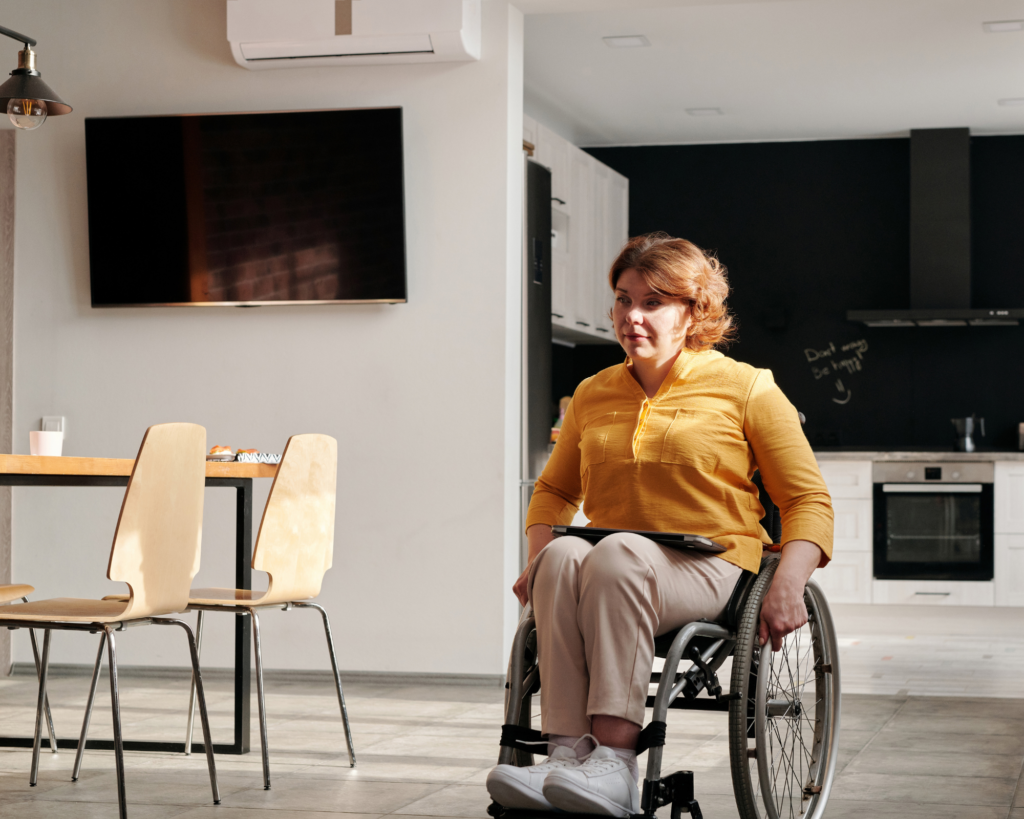 Woman using a wheelchair at work