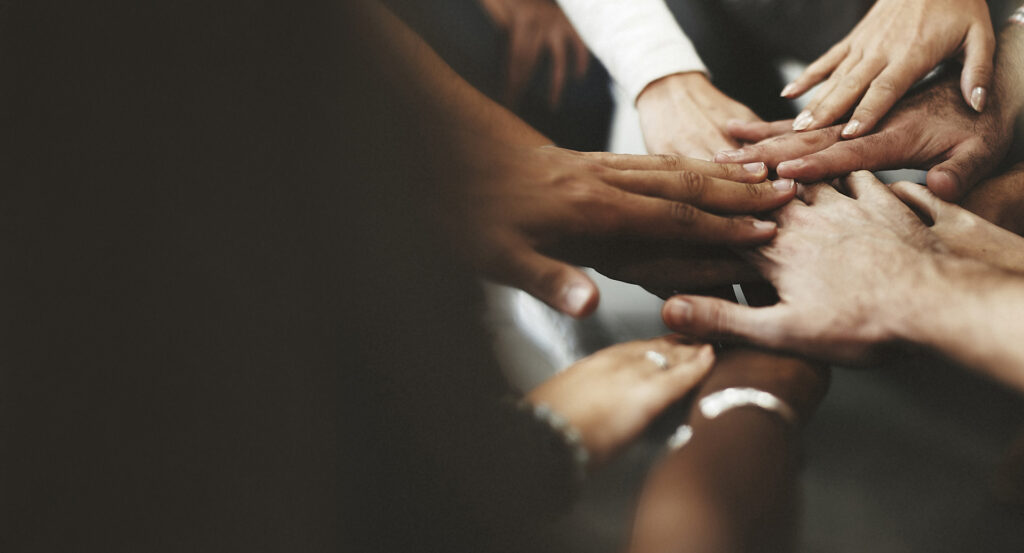 team hand stack close up