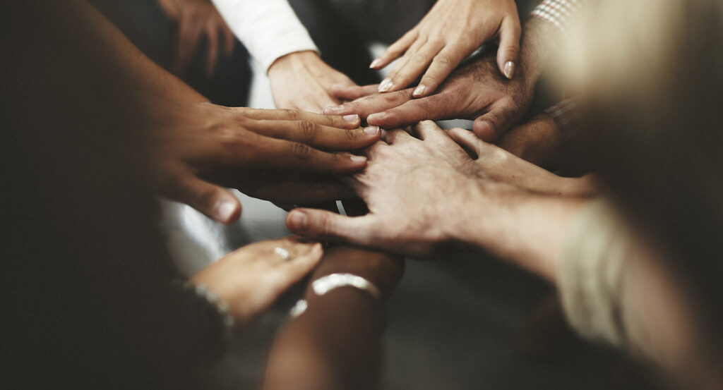 team hand stack close up