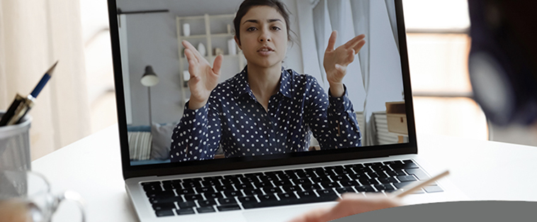 Woman hosting a one-to-one Zoom meeting